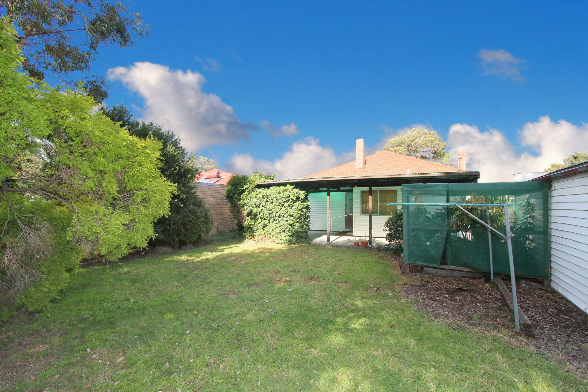 WELL- LOVED THREE BEDROOM HOME !
