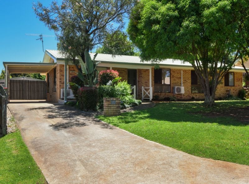 Quality Brick Home in Tree Lined Street