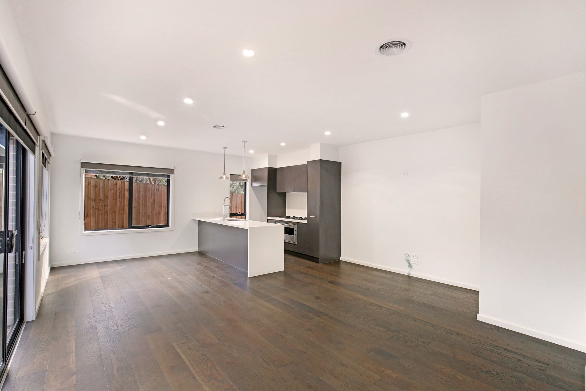 Immaculate, modern,  low maintenance and ready to call home!