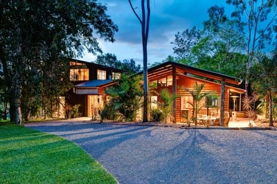 Glass walls showcase the breathtaking surrounds, inviting the outdoors in 