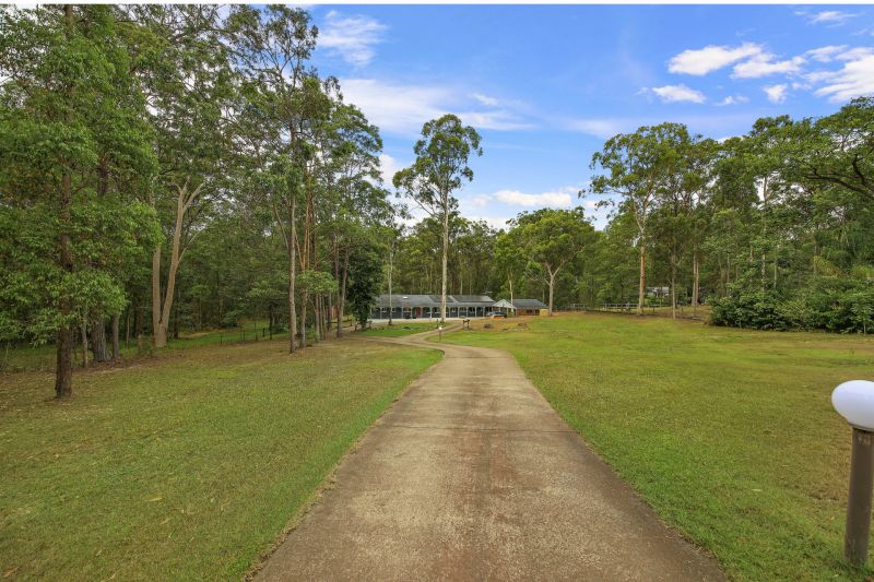 Peaceful and Private Dual living Acreage home opposite Lake Samsonvale & Reserve