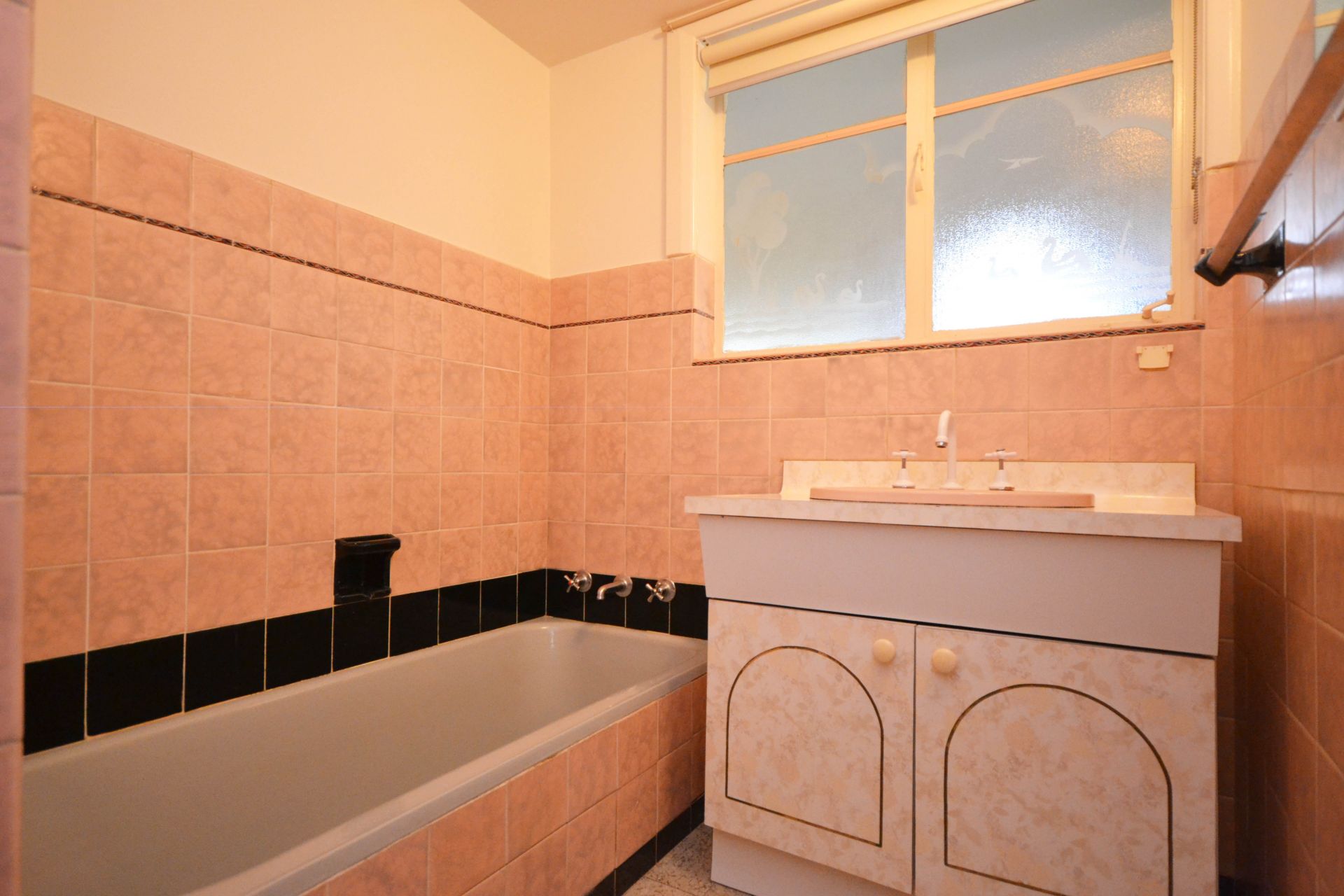 FRESHLY PAINTED THREE BEDROOM HOME