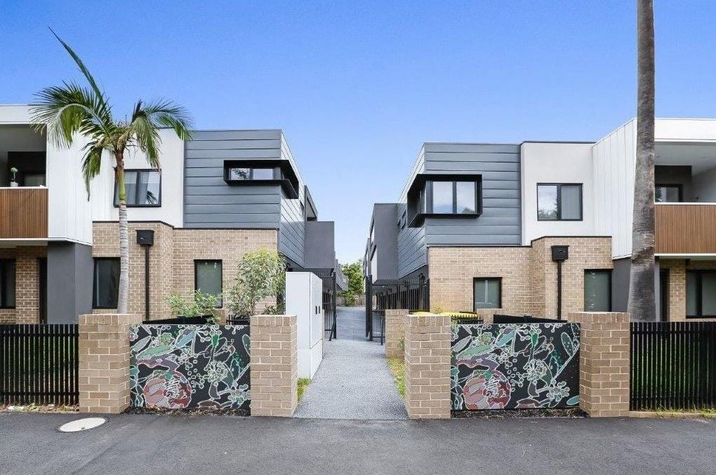 AS NEW THREE BEDROOM THREE BATHROOM TOWNHOUSE