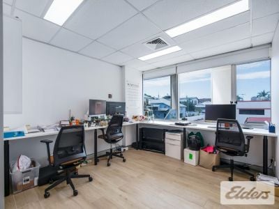 STRATEGICALLY POSITIONED OFFICE WITH 5 CARS!