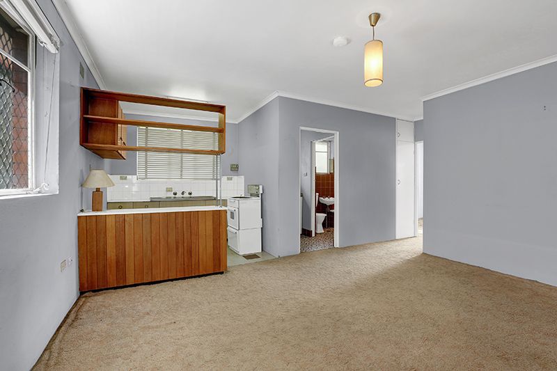 SOLD - Potential-Packed Top Floor Apartment with City Views