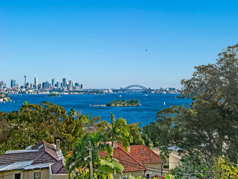 Spanish Mission Manor with iconic gun barrel Harbour views