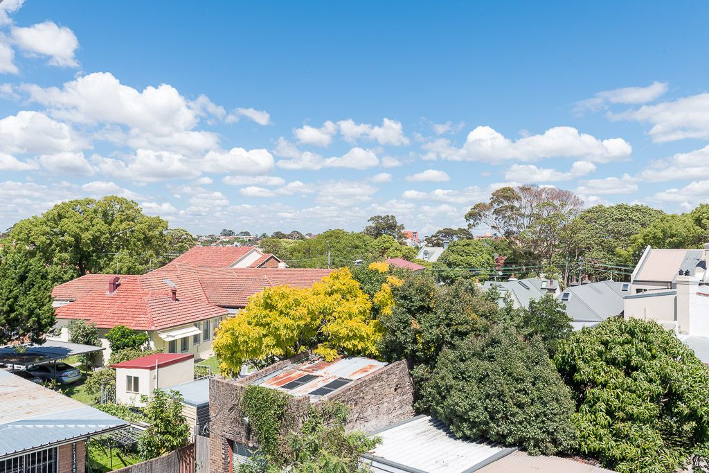 SOLD - Light and Style in a Top Floor Apartment