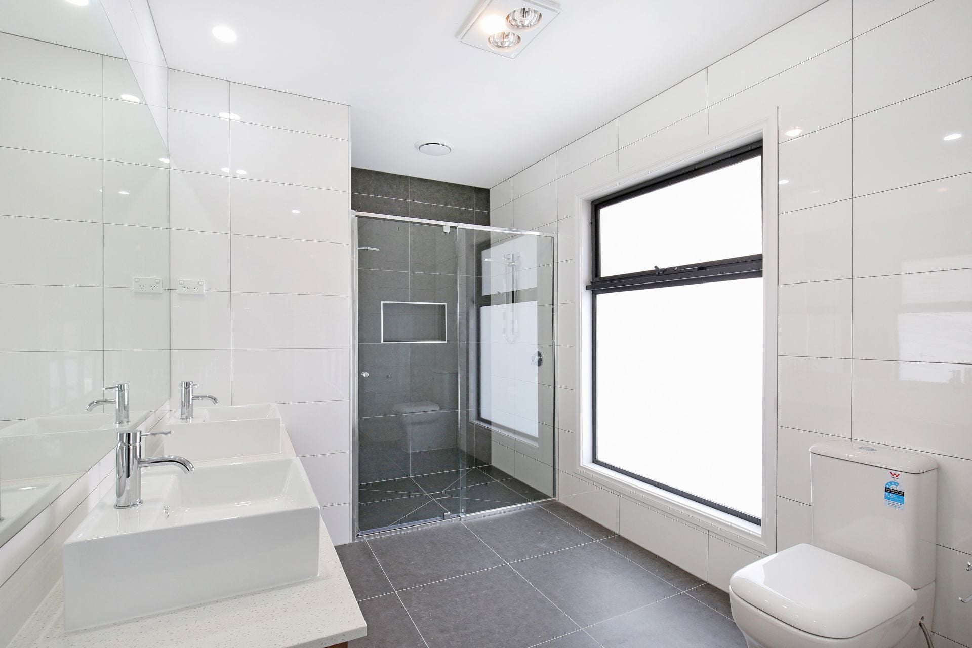 Chic and Modern Family Living Awaits in This Newly Built Family Home!