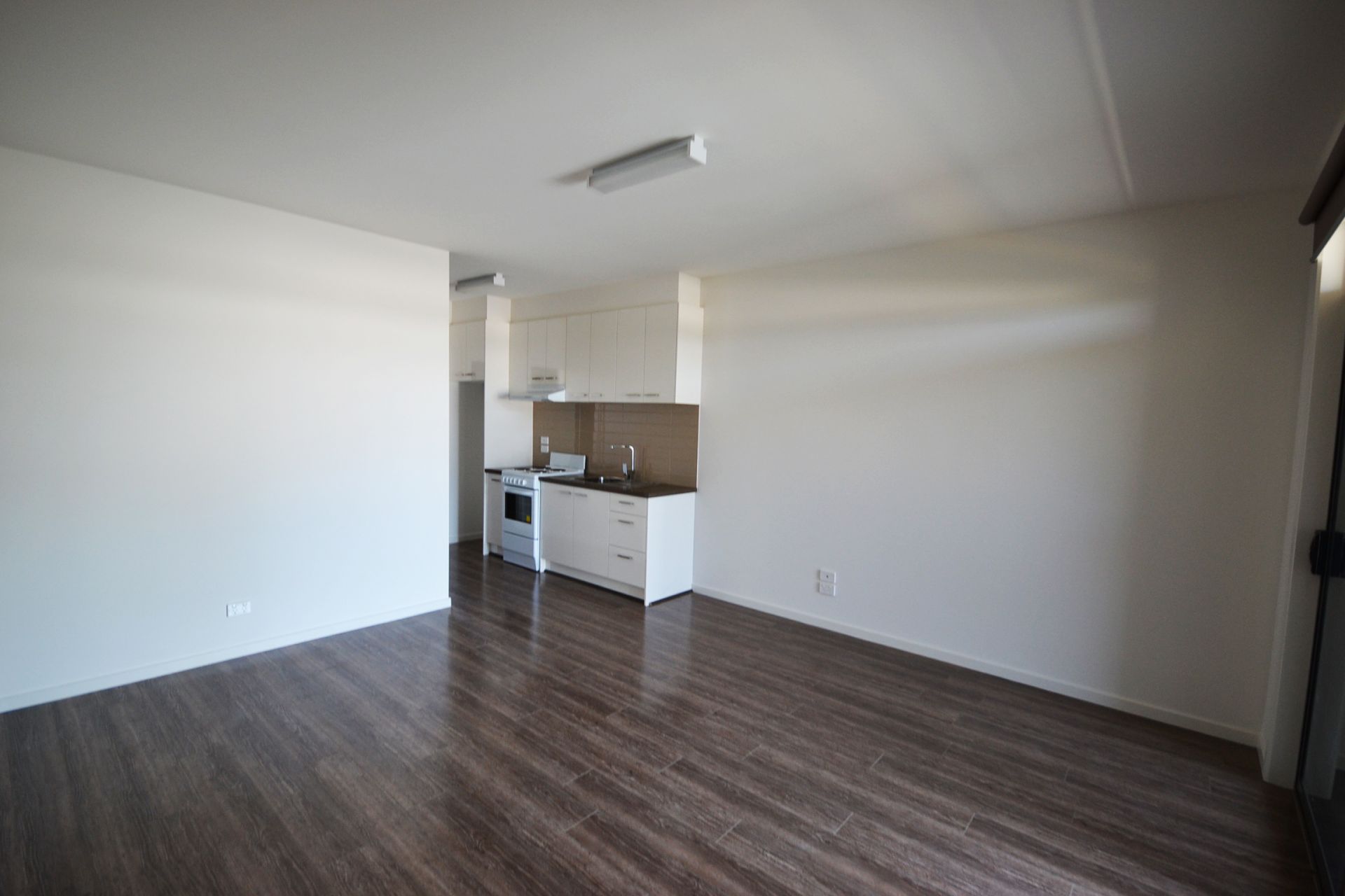 AS NEW APARTMENT IN A GREAT LOCATION - COLES, TRAM & BUS AT FRONT DOORSTEP!