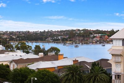 Top Floor Living with Water & City Panoramas