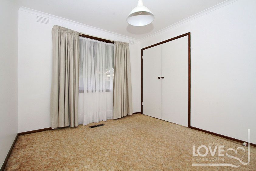 THIS SPACIOUS HOME WILL BE SURE TO IMPRESS