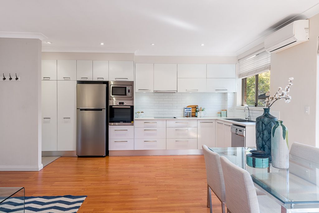 Sold - Renovated Top Floor Apartment with Large North Facing Balcony and Lock up Garage