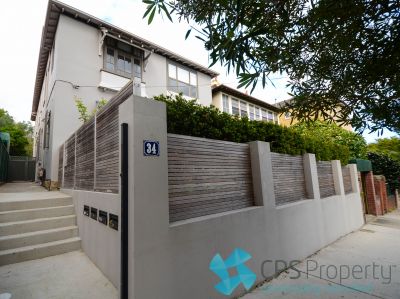 STYLISHLY UPDATED TWO BEDROOM ART DECO RESIDENCE WITH PRIVATE FENCED YARD