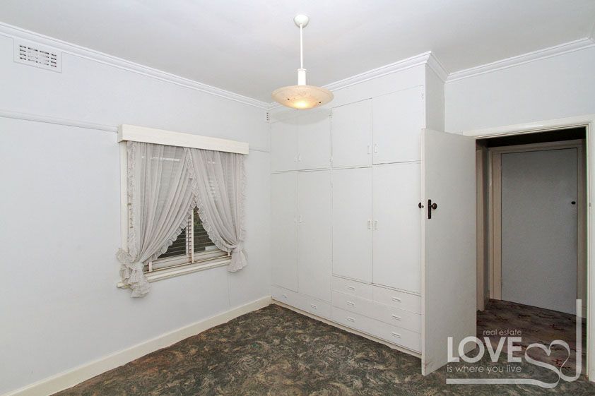 PERFECTLY LOCATED THREE BEDROOM HOME