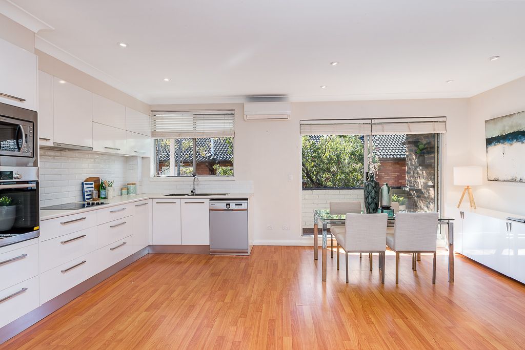 Sold - Renovated Top Floor Apartment with Large North Facing Balcony and Lock up Garage