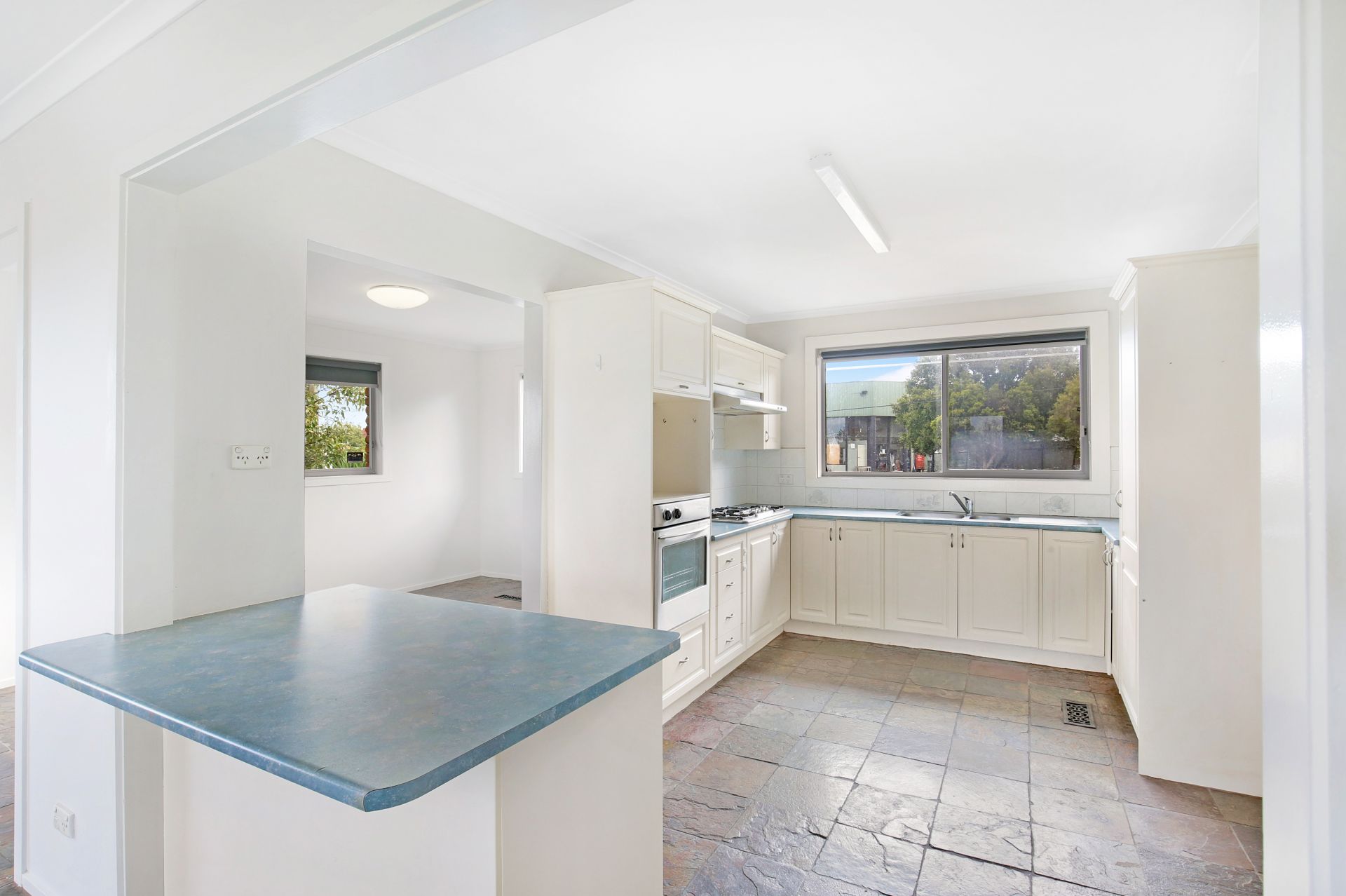 Hidden Gem in Fantastic Location ! Three bedrooms, work shop, double garage!
