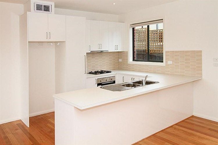 Three Bedroom Townhouse With Double Lock-Up Garage!