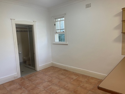 Freshly painted top floor studio apartment - unfurnished
