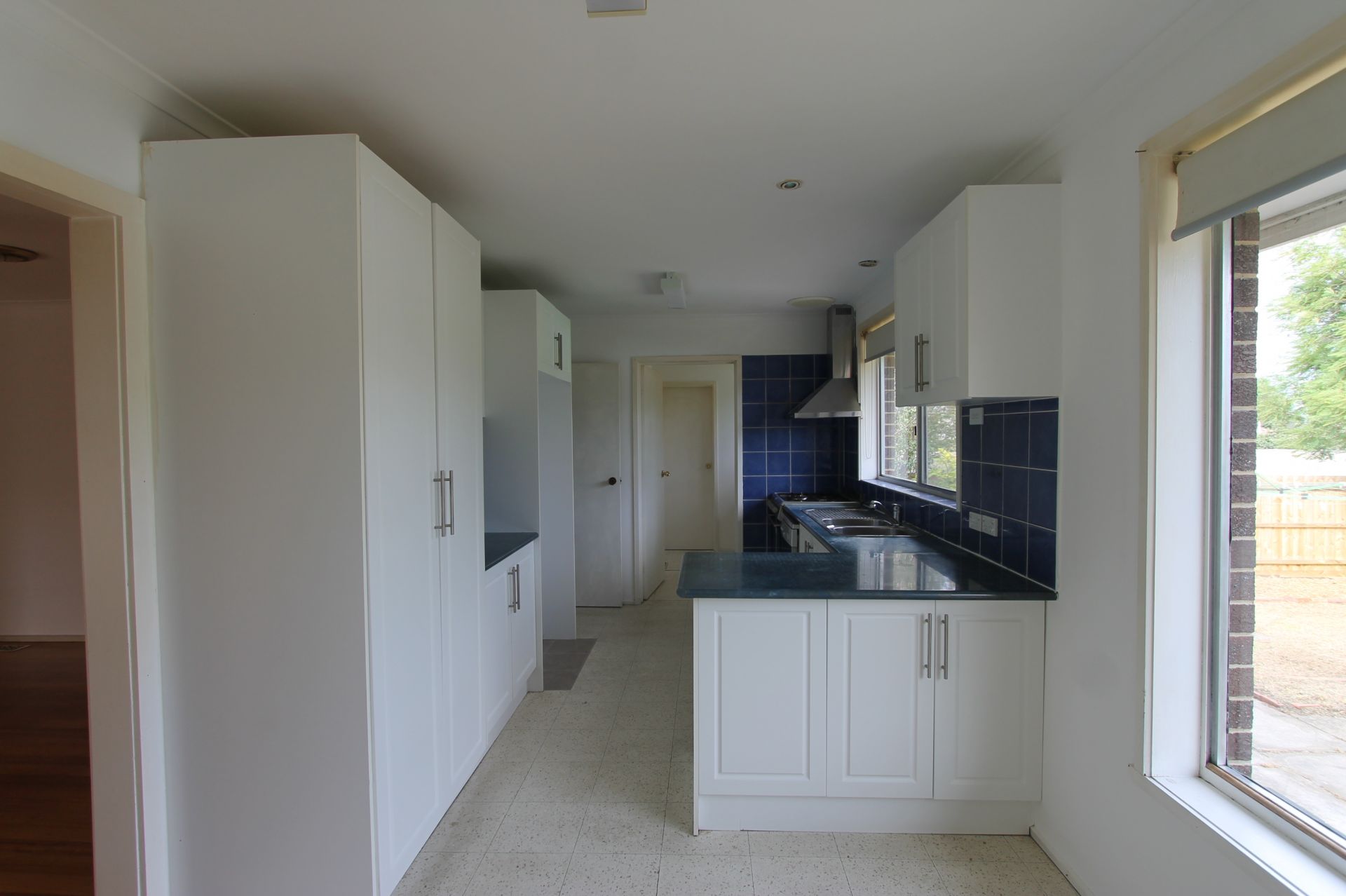 Freshly Painted Four Bedroom Home