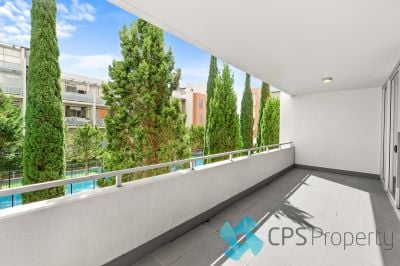 GENEROUS LIGHT-FILLED ONE BEDROOM RESIDENCE IN RESORT-STYLE COMPLEX