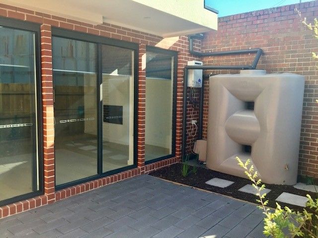 Architecturally Designed Near New Tri-Level Townhouse