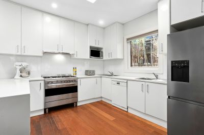GENEROUS LIGHT-FILLED FULL BRICK SEMI IN A QUIET LEAFY CUL-DE-SAC