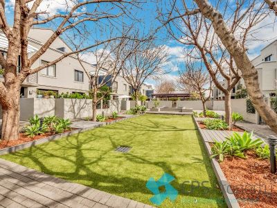 NORTH-FACING TWO BEDROOM GARDEN APARTMENT IN POPULAR 'NEOMETRO' COMPLEX