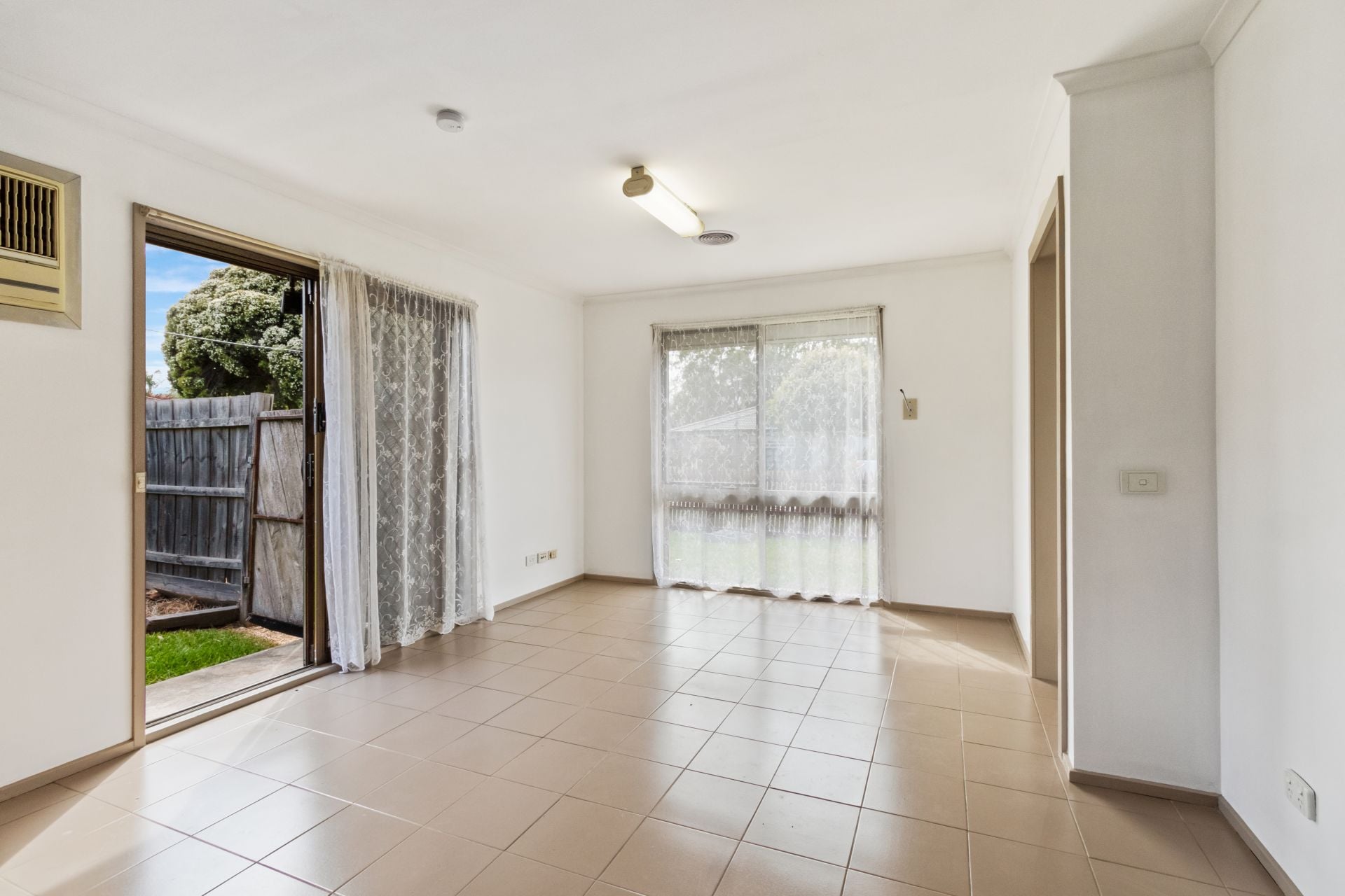 CONVENIENTLY LOCATED WITH A LARGE YARD