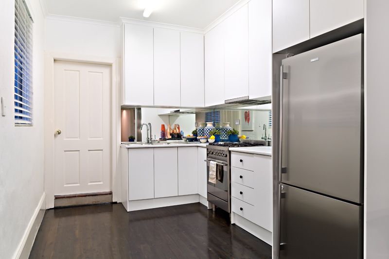 SOLD - Position, Size and Charm in a Traditional Brick Terrace