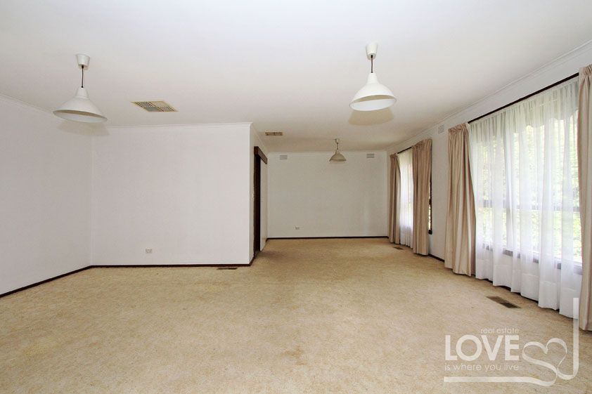 THIS SPACIOUS HOME WILL BE SURE TO IMPRESS