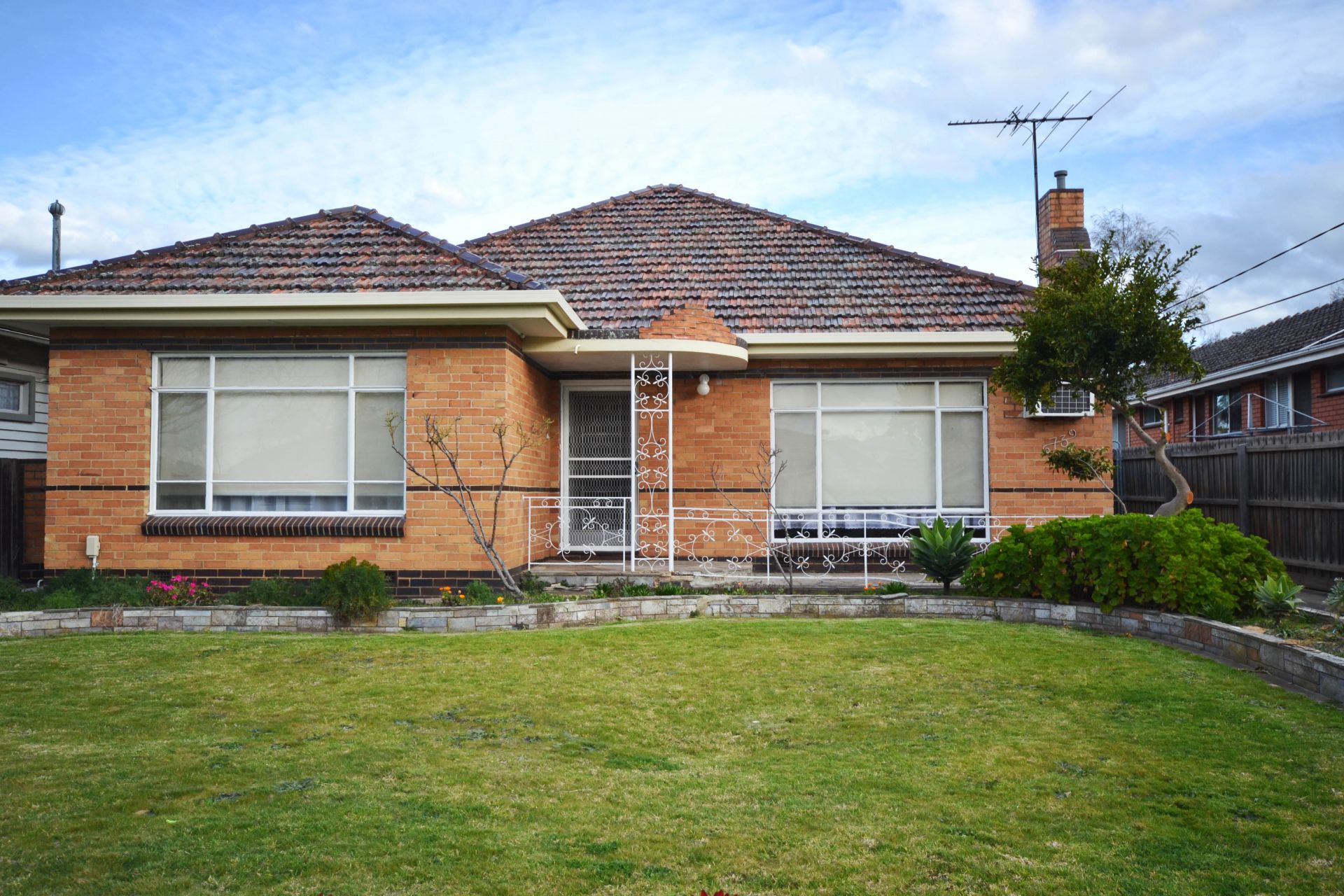 FRESHLY PAINTED THREE BEDROOM HOME