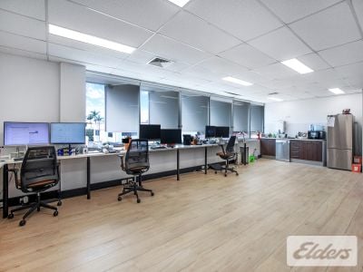 STRATEGICALLY POSITIONED OFFICE WITH 5 CARS!