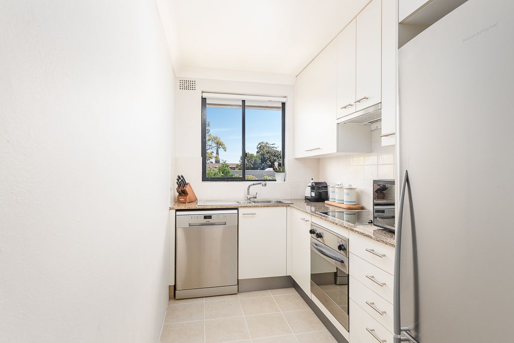 SOLD - Light and Style in a Top Floor Apartment