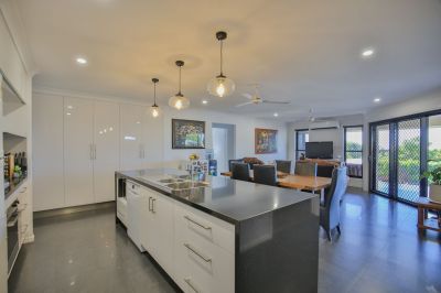 IMMACULATE FAMILY PACKAGE WITH PRIVATE YARD, BIG OUTDOOR AREA + SOLAR!