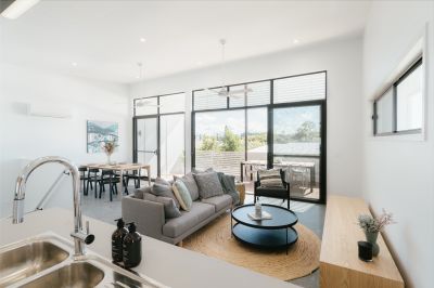 Central, Sophisticated, Effortless Townhouse Living!