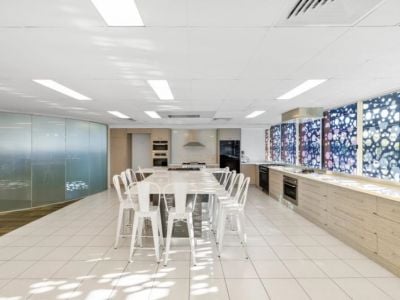 VERSATILE OFFICE/SHOWROOM/WAREHOUSE ON PROMINENT CORNER