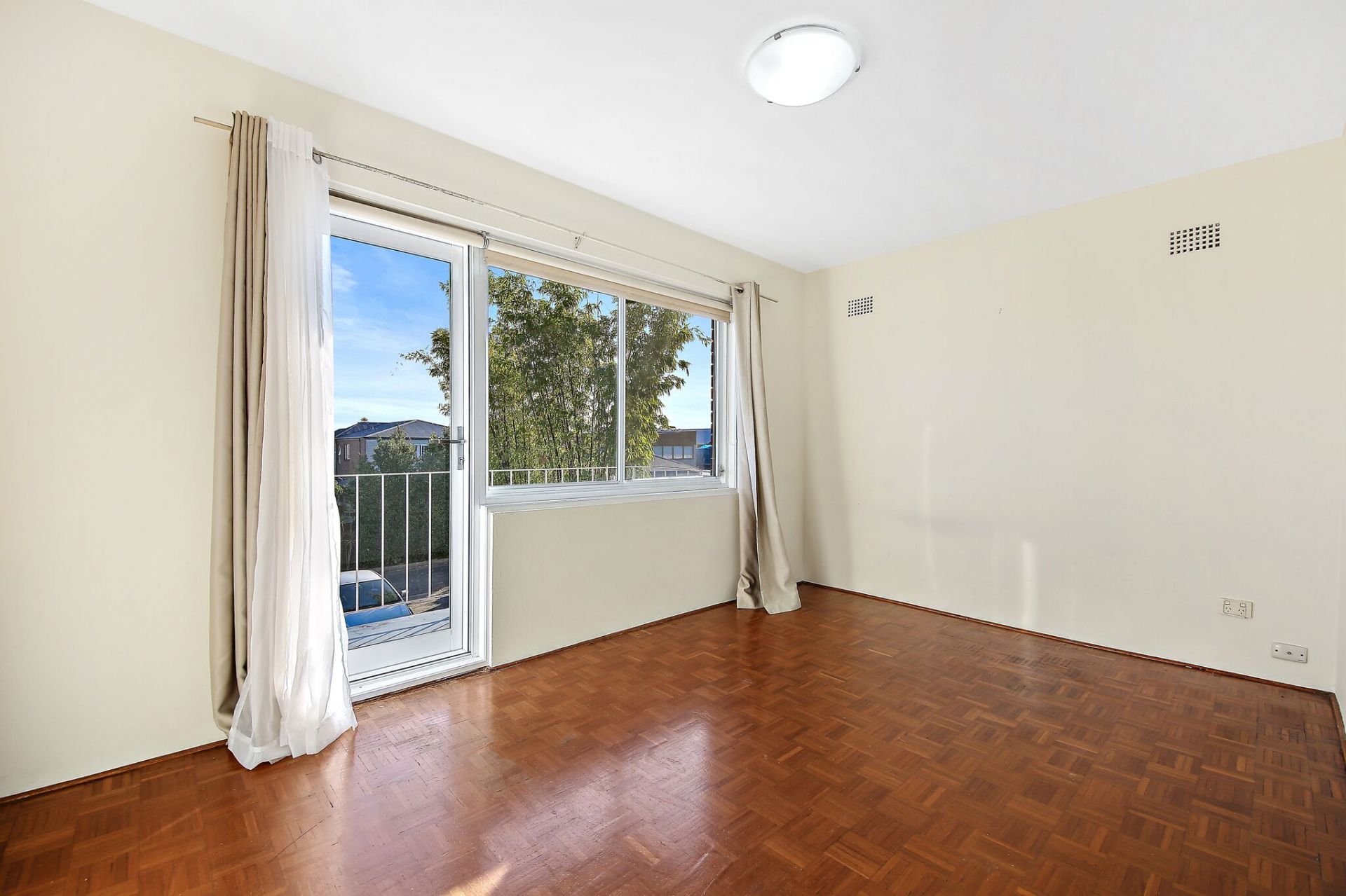 Sunny Two Bedroom Security Unit with Water Glimpses