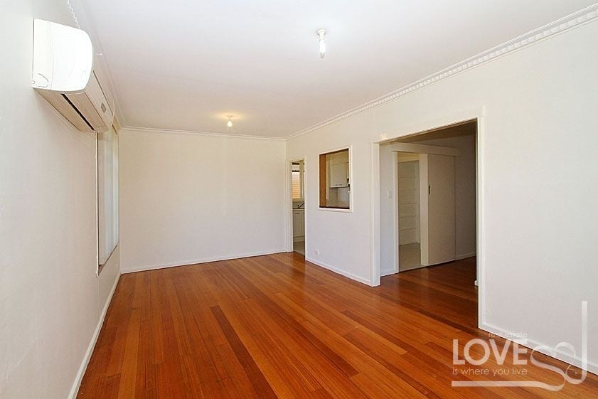 LOW MAINTENANCE PROPERTY IN AN IDEAL LOCATION