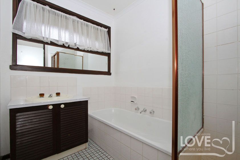 THIS SPACIOUS HOME WILL BE SURE TO IMPRESS