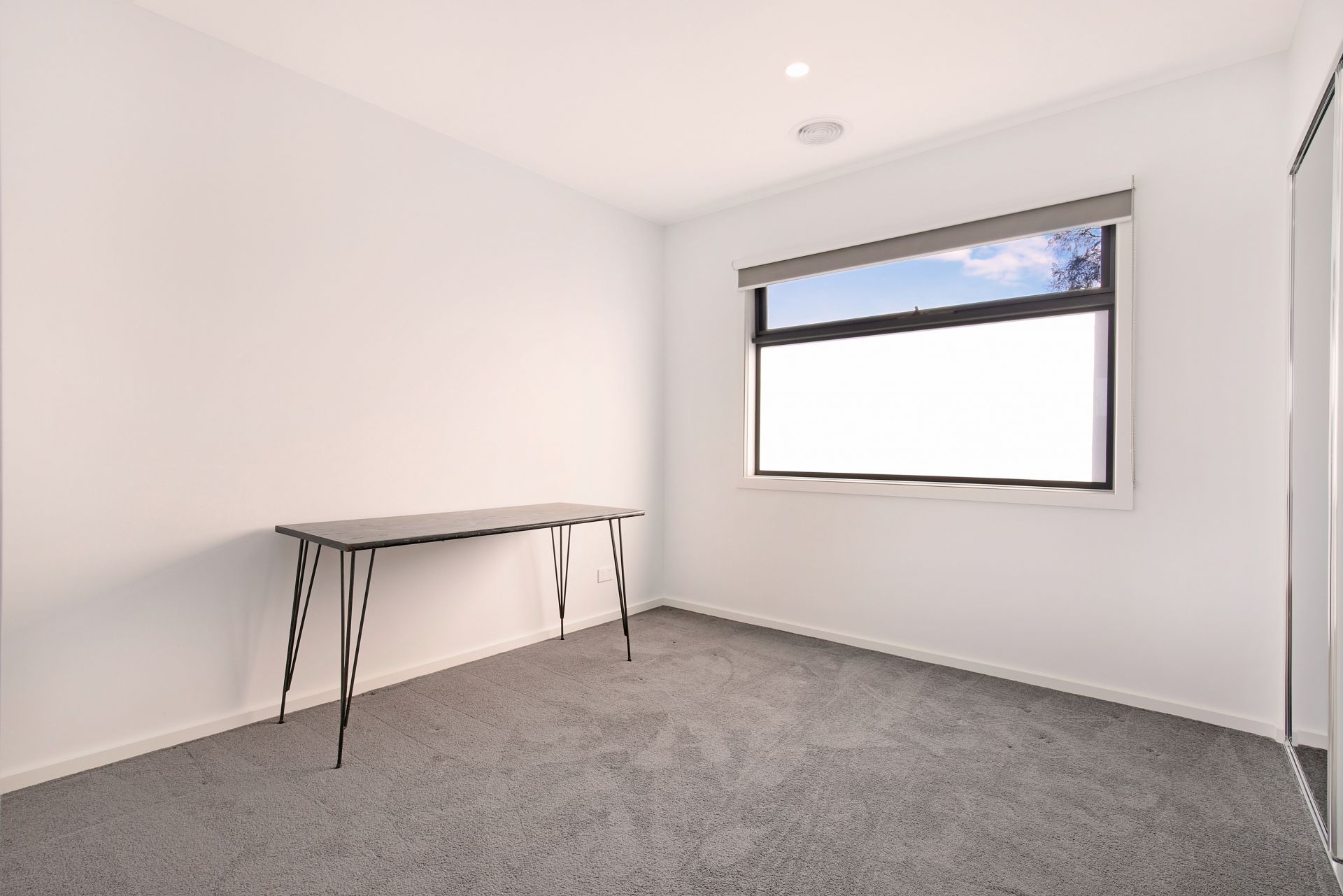 Immaculate, modern,  low maintenance and ready to call home!