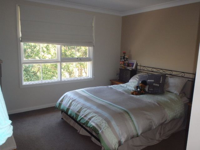 **Located in lovely tree-lined street**