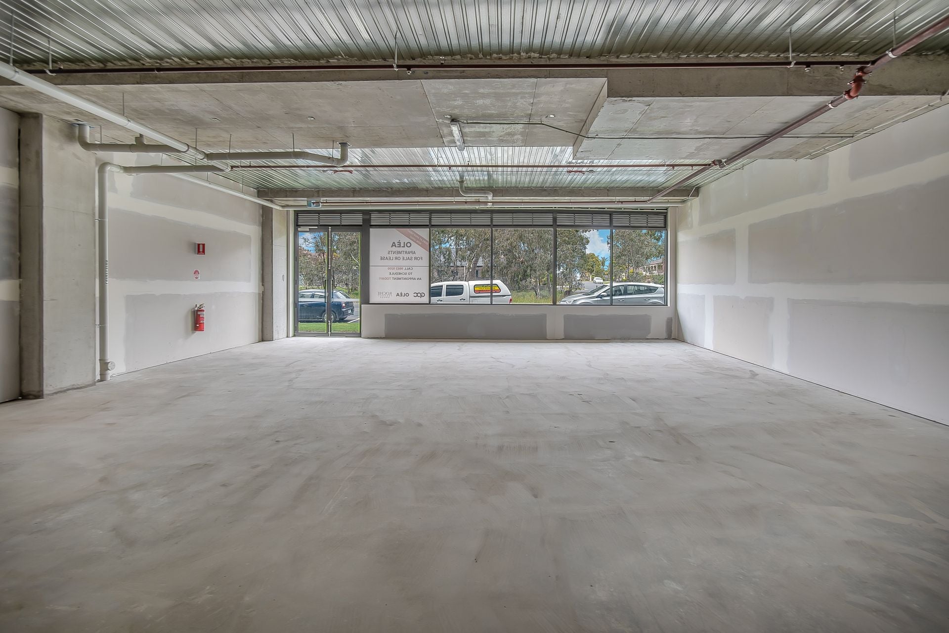 Brand New High Profile Retail Space - OWNER WILL CONSIDER ALL OFFERS
