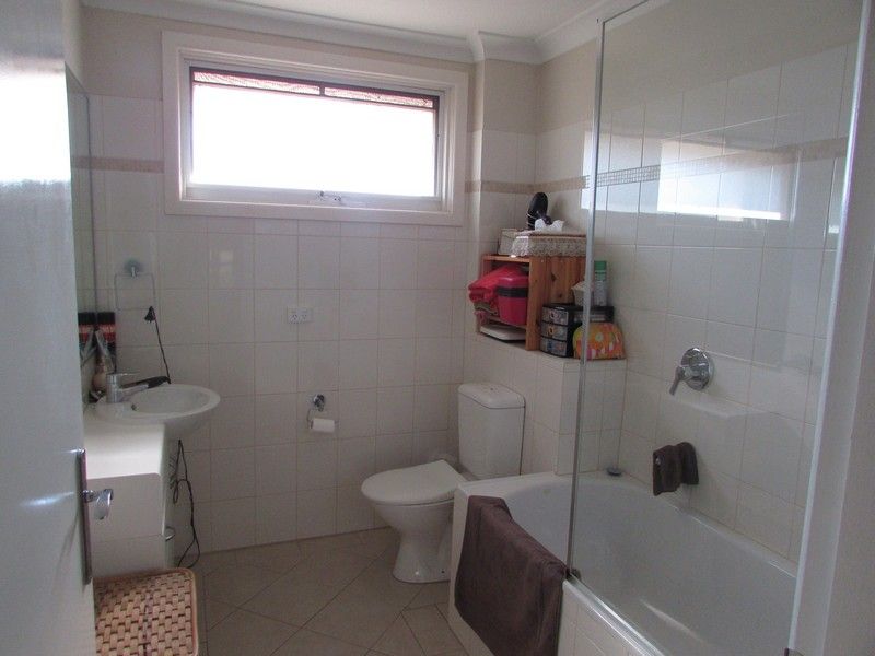 **Located in lovely tree-lined street**