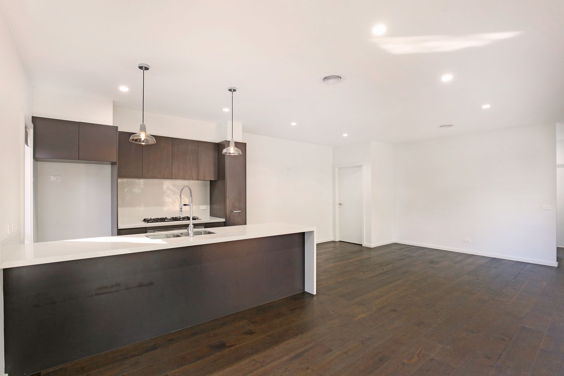 Immaculate, modern,  low maintenance and ready to call home!