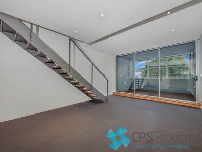 EXECUTIVE URBAN SPLIT-LEVEL TWO BEDROOM RESIDENCE IN LANDMARK 'CODA' COMPLEX